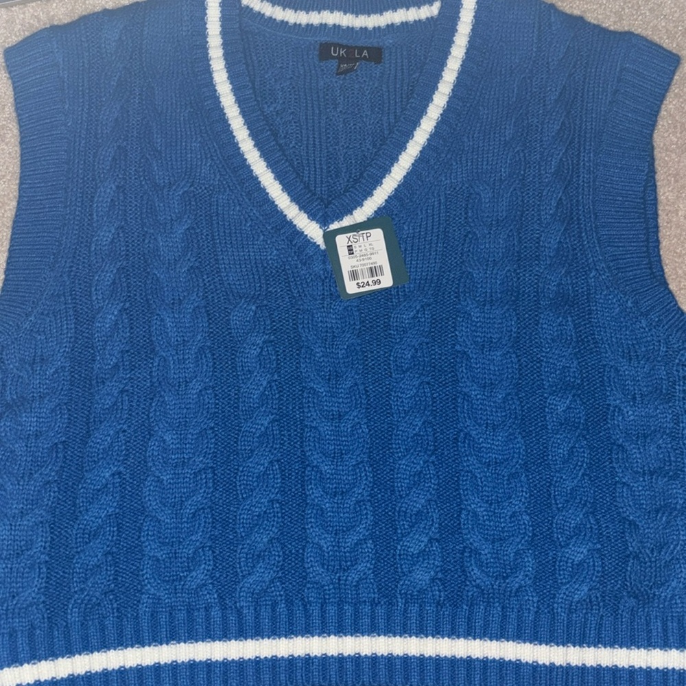 A little sweater you can style with a long sleeve under!